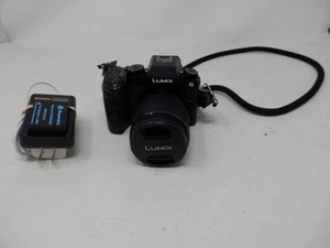 Panasonic DMC-G7 16,0 MP CON LENTE SIN ESPEJO DE 12-60 MM funcionando con batería y cargador - Imagen 1 de 10