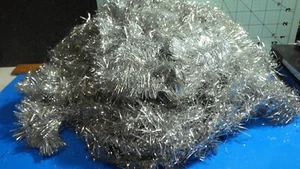 several vintage strands of string tied silver garland + strip of older one free - Picture 1 of 3