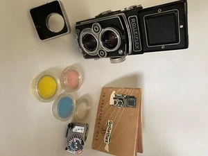 Rolleiflex 3.5  W/ Carl Zeiss Tessar 1:3. 5  f  75mm Lens, Film camera  - Picture 1 of 1