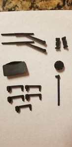 Accesorios a escala de radiocontrol. Kit de vestir JK - Imagen 1 de 12