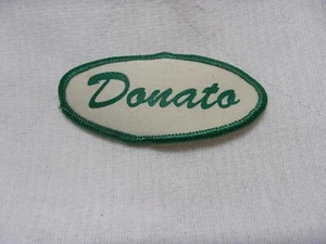 DONATO GEBRAUCHT SIEBDRUCK VINTAGE AUFNÄHEN NAME PATCH ETIKETTEN OVAL GRÜN AUF WEISS - Bild 1 von 2