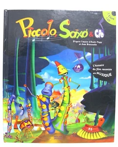 152089 Book PICCOLO, SAXO & CIE Musical Instruments French HB Book with CD EUC - Picture 1 of 8