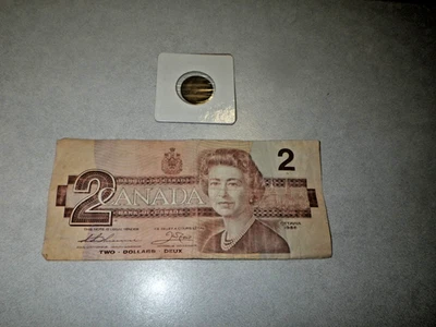 Lote de 2: (1) Billete de 2 dólares de Canadá 1986 + (1) centavo canadiense 1978 Foto 1 de 4