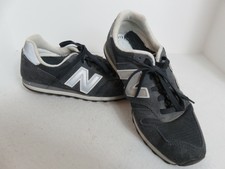 new balance black & gold 373 suede & mesh trainers