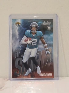 2025 Absolute Football - Travis Hunter - By Storm - Jaguars - RC - #17 - Bild 1 von 2