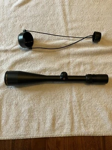 Bushnell elite 3200 rifle scope Japan 3-9x50mm with rain guard, and lens covers. - Picture 1 of 4