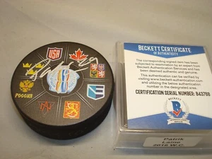 Patrik Laine Signed 2016 World Cup Hockey Puck Autographed Beckett BAS COA 1B - Picture 1 of 4