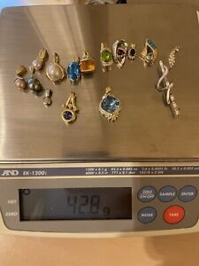 14 kt gold fine jewelry Colored Stone And Diamond pendant lot (42.8 Grams)