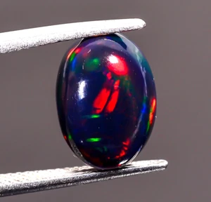 Piedra preciosa suelta cabujón forma ovalada ópalo etíope negro natural 2,5 quilates 12x8x4 mm - Imagen 1 de 3