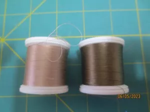 2 YLI Silk Threads 200 meters Khaki # 235 & Pinky Brown # 242 Both near full - Picture 1 of 2
