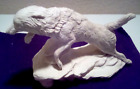 Wolf Leaping Off Rock Ceramic Bisque