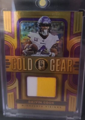 DALVIN COOK 2023 PANINI GOLD STANDARD GOLD GEAR JERSEY 22/24 - Image 1 of 2