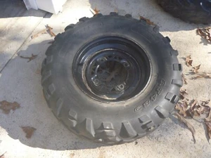 OEM 94-95 Polaris 400 Sportsman Front Wheel Rim w/ Tire 12x6.0at - Picture 1 of 1