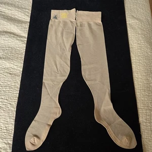 Par de medias vintage planas de nailon transparente hasta el muslo talla 3 - Imagen 1 de 12