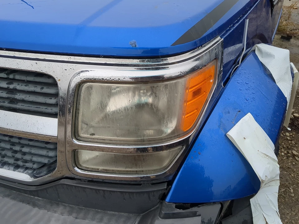 Левая оригинальная фара головного света для Dodge Nitro 2007-2011 годов выпуска J899T - Изображение 1 из 1