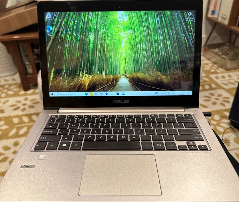 PC portátil Asus ZenBook UX303UB Intel i7-6500U 12 GB RAM 953 GB SSD 13" pantalla táctil Foto 1 de 4