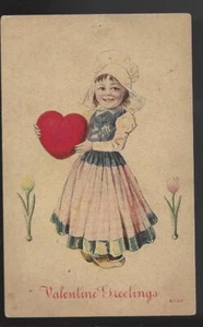 Antique postcard Valentine greetings dutch girl heart pouch stored some writing - Picture 1 of 2