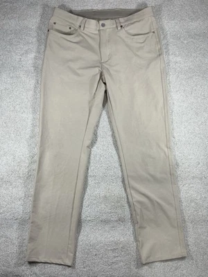 Pantalones de rendimiento de golf Greg Norman para hombre color caqui tostado talla 34x32 Foto 1 de 4