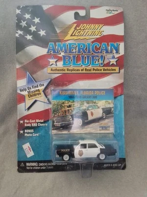 JOHNNY LIGHTNING AMERICAN BLUE KISSIMMEE FLORIDA POLICE  (4/21) - Image 1 of 4