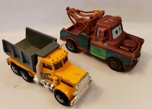 2 Die-Cast Trucks 1 Mattel Cars Mvie 1 Matchbox Peterbuilt Tipper, Complete. - Picture 1 of 9