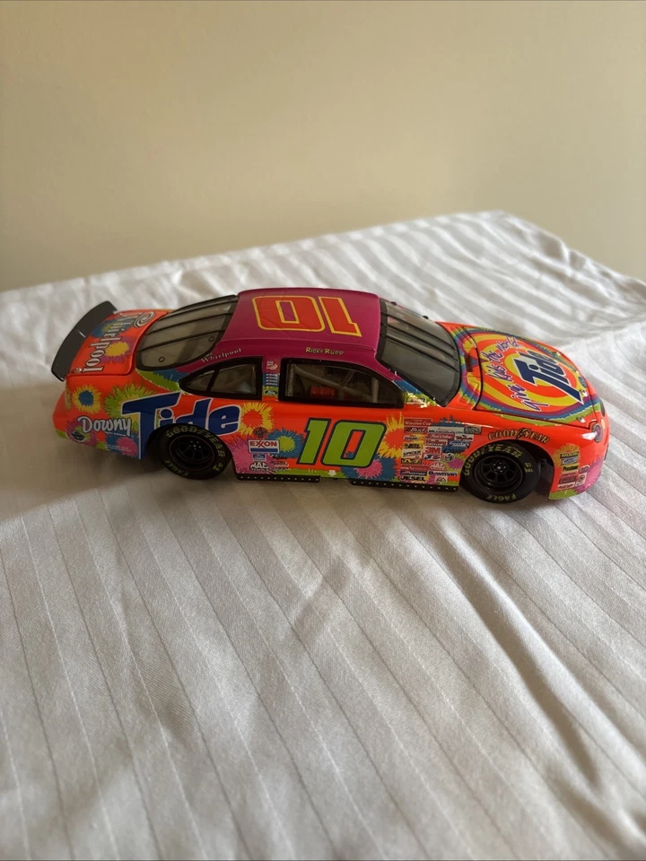 ACTION RICKY RUDD NO10 1998 FORD TAURUS TIDE GIVE KIDS THE WORLD NASCAR 1:24 - Изображение 1 из 4