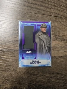 2021 Topps Star Wars Battle Plans Tobias Beckett Trench Coat /25 Fabric Relic - Picture 1 of 3