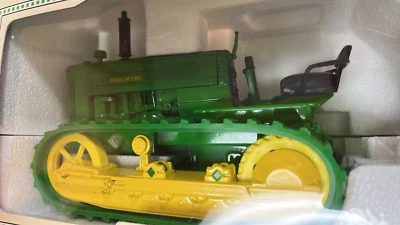 Caja colectora sobre orugas John Deere 40 Foto 1 de 3