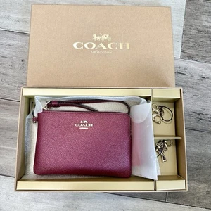 Bracelet Coach coin zippé avec 2 breloques coffret cadeau CF547 noir cerise paillettes - Photo 1/7
