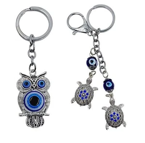 Juego de 2 llaveros para mal de ojo búho y tortuga anillo colgante Feng Shui - Imagen 1 de 4