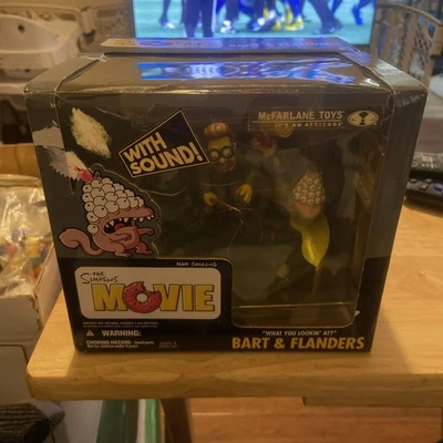 PELÍCULA DE LOS SIMPSON LO QUE MIRAS DE LUJO SET EN CAJA MCFARLANE TOYS FLANDERS Foto 1 de 4