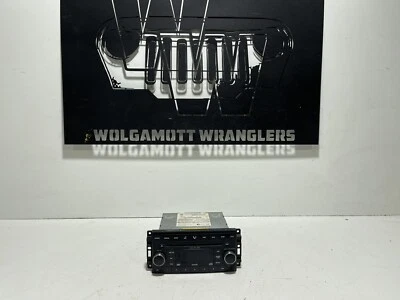 Jeep Wrangler JKU JK 2007 AM FM Radio Sirius reproductor de CD de 6 discos 05064113AJ OEM CC Foto 1 de 4