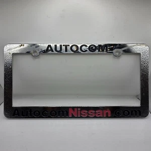 Nissan Auto Com Silver Plastic License Plate Frame Front Or Rear Cars Trucks - Picture 1 of 2
