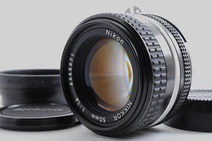 Nikon NIKKOR AI-S 50mm F1.4 MF Standard Objektiv für F Mount mit HR-4 Haube NEUWERTIG Japan - Bild 1 von 14