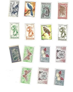 15 Madagaskar Briefmarken 30er 60er Jahre Schmetterlinge Vögel Menschen Zebu UNBENUTZT - Bild 1 von 2