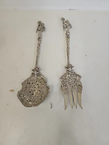 Antiguo tenedor y cuchara italiana de latón con cresta de querubín de león 11" GQ4 - Imagen 1 de 14