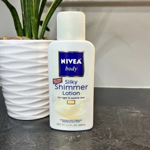Neu Nivea Body Silky Shimmer Lotion helle bis mittlere Haut 6,8oz eingestellt - Bild 1 von 3
