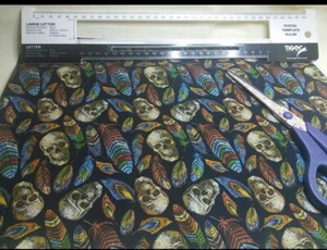100% Cotton Fabric Little Johnny little skull ,feather extra wide half m - Picture 1 of 1