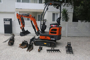 Great little excavator, lots of attachments - top condition and price