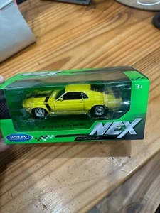 Ford Mustang Boss 302 1970 1/24 Diecast Model by Welly - Yellow 29370 - Picture 1 of 3