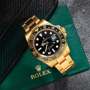 Rolex GMT Master II 40mm 18K Yellow Gold Black Dial Oyster Bracelet - 116718 - Picture 1 of 6