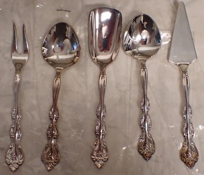 Vintage International Silverplate Appetizer Dessert Utensils - Image 1 of 4