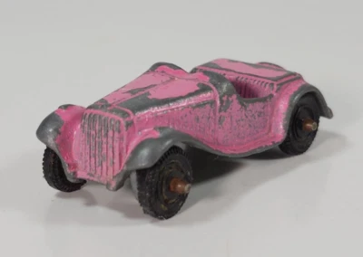 Coche fundido a presión vintage Tootsietoy MG Roadster modelo a escala 2" rosa Foto 1 de 4