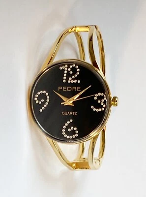 Reloj brazalete mujer Pedre tono dorado. Excelente estado. ¡Funciona! Foto 1 de 2
