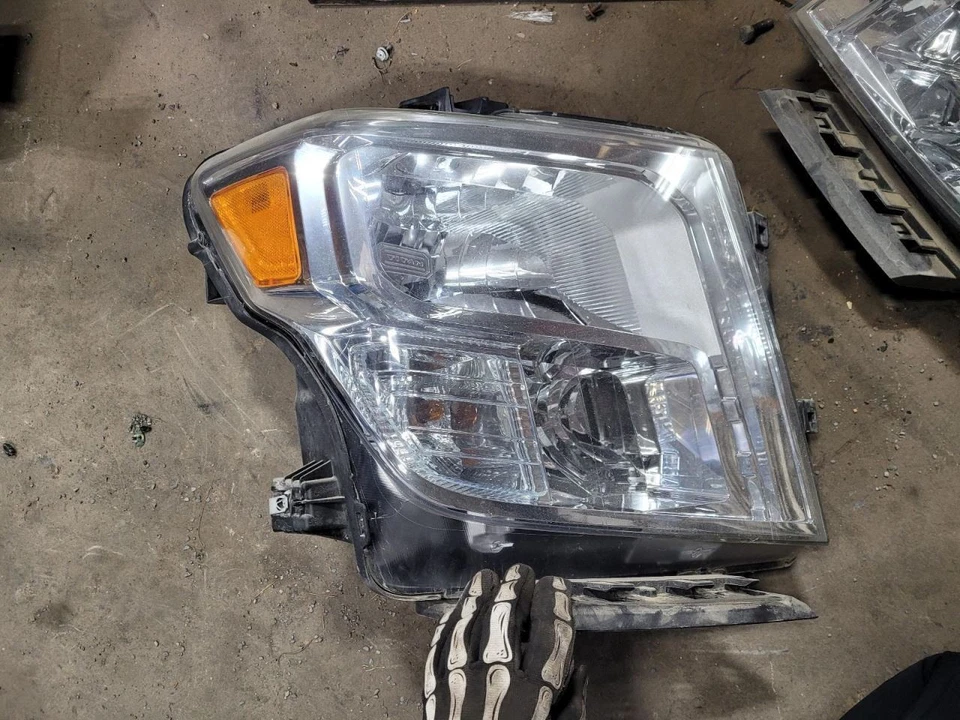 Passenger Headlight Halogen Chrome Interior Bezel Fits 16-19 TITAN XD 2050713 - Image 1 of 4