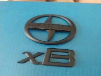 EMBLEMA OEM NEGRO SCION xB con logo Foto 1 de 4