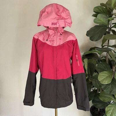 Chaqueta de Lluvia Helly Hansen Vancouver (L) Mujer Abrigo Con Capucha Rosa Bloques de Color Retro Foto 1 de 4