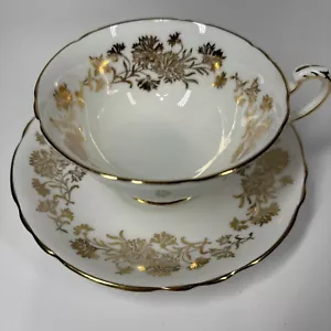 GOLDEN CARNATION Paragon Tea Cup Saucer Set Gold White England Fine Bone 1 - Picture 1 of 10