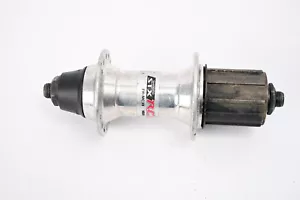 Vintage Shimano STX RC PARALLAX FH-MC38, 8 Speed Silver 32h Rear Hub MTB Bike - Picture 1 of 4