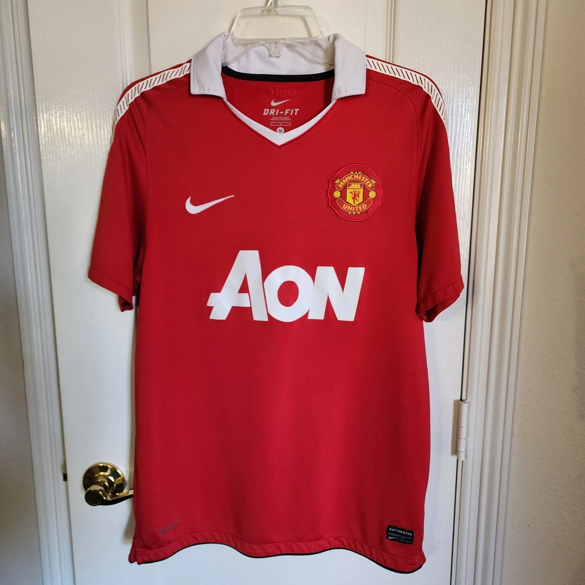 Preços baixos em Nike Manchester United International Club Camisas