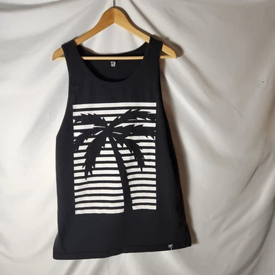 Camiseta sin mangas negra blanca silueta de palmera gráfica rayas horizontales playa surf Foto 1 de 4